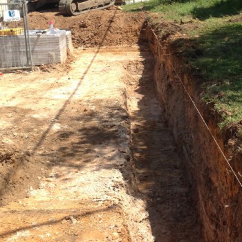 Retaining wall footing